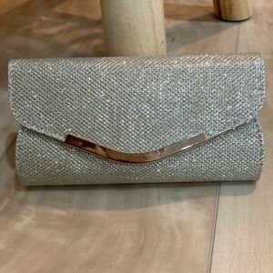 Gold sparkle clutch